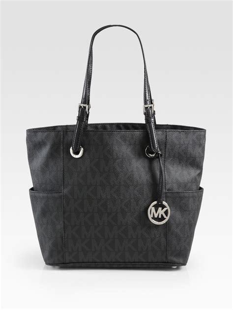 michael kors round signature change purse|Michael Kors signature tote gray.